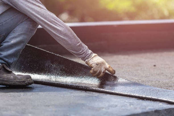 Professional Basement Waterproofing technician working in Getzville, NY